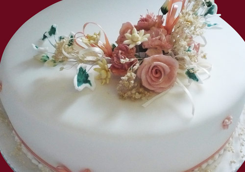 A cake with Iced Flowers on the top